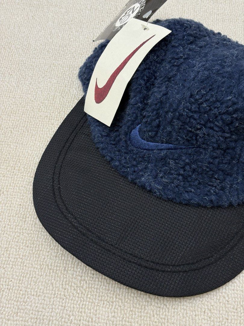 Vintage Nike ACG Hat (Category: Caps & Hats) located in Manila. Submitted by porma.market (Listing ID 1460519370, Image 1). Description: - Vintage Nike ACG Hat - Cozy fuzzy navy blue material - Contrasting black brim - Iconic Nike ACG branding - 1990s Hat - Authentic -4,800.