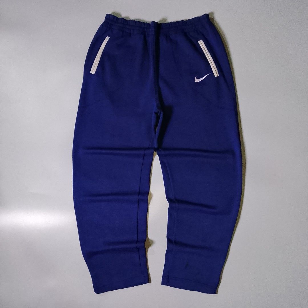 Vintage Nike Sweatpants (Category: Joggers) located in Taguig. Submitted by 8kthrifter (Listing ID 1460635575, Image 1). Description: Size: Extra Large Waist: 30 (adjustable) Length: 37 Color Rate: 10/10 Issue: stain,change lace (see last 2 photo) Excellent Condition.