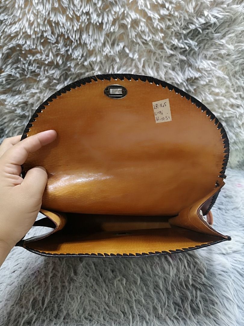Vintage Style Hand Tooled Brown leather Shoulder Bag (Category: Shoulder Bags) located in Santa Cruz. Submitted by jmy_surplus.2 (Listing ID 1460596721, Image 2). Description: Size ; L - 9 W - 10.5 Color ; Brown Type ; Shoulder Bag Brand ; No brand Material ; leather Style ; Brown Floral Embossed Pattern Shoulder bag LR 165 JMY 1 Batch #219.
