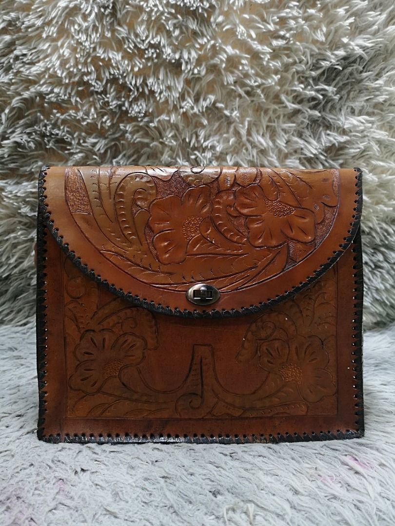 Vintage Style Hand Tooled Brown leather Shoulder Bag (Category: Shoulder Bags) located in Santa Cruz. Submitted by jmy_surplus.2 (Listing ID 1460596721, Image 1). Description: Size ; L - 9 W - 10.5 Color ; Brown Type ; Shoulder Bag Brand ; No brand Material ; leather Style ; Brown Floral Embossed Pattern Shoulder bag LR 165 JMY 1 Batch #219.