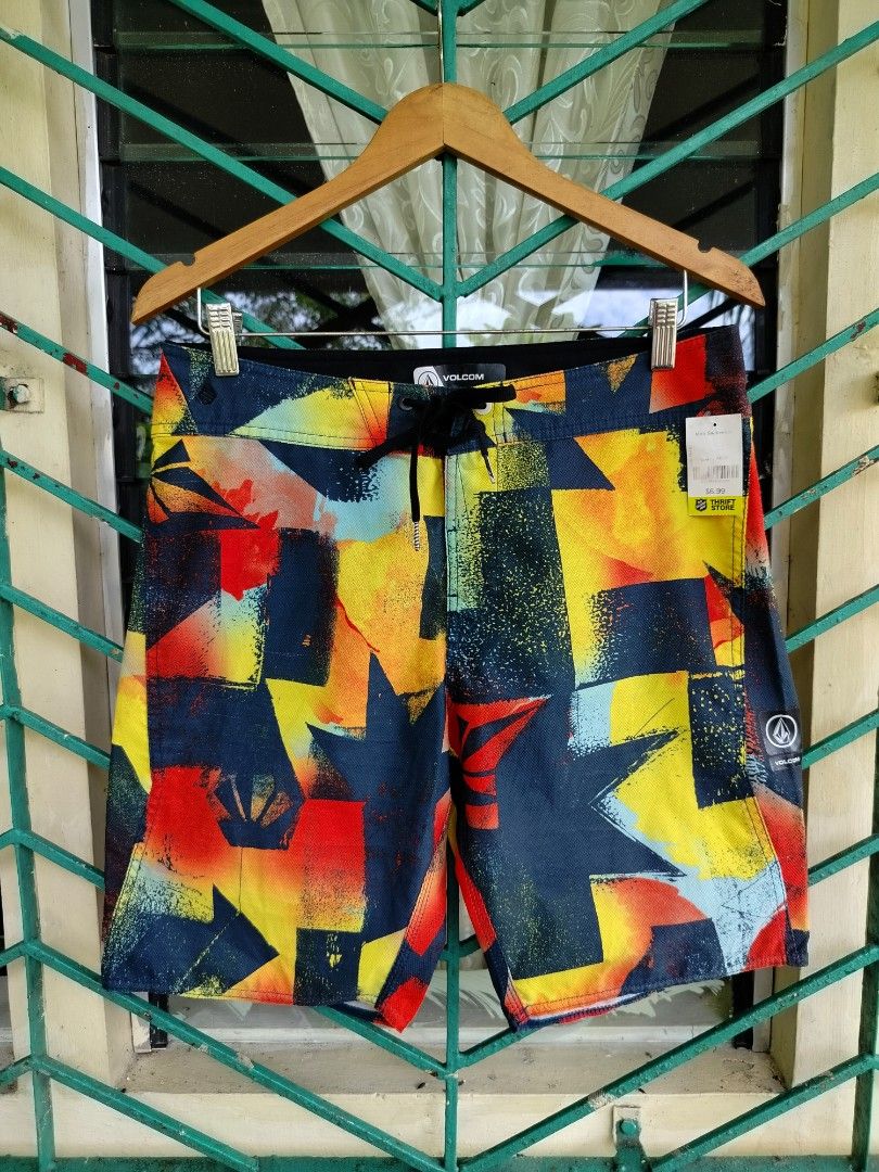 Volcom Board Shorts Size 30 - Abstract Print (Category: Shorts) located in Manila. Submitted by geraldquinto_917 (Listing ID 1460591484, Image 1). Description: - Cool abstract print Volcom board shorts - Size 30 - Drawstring waist - Back pocket with velcro closure - Vibrant and eye-catching colors - Ideal for swimming, lounging, beach trips, or pool days.