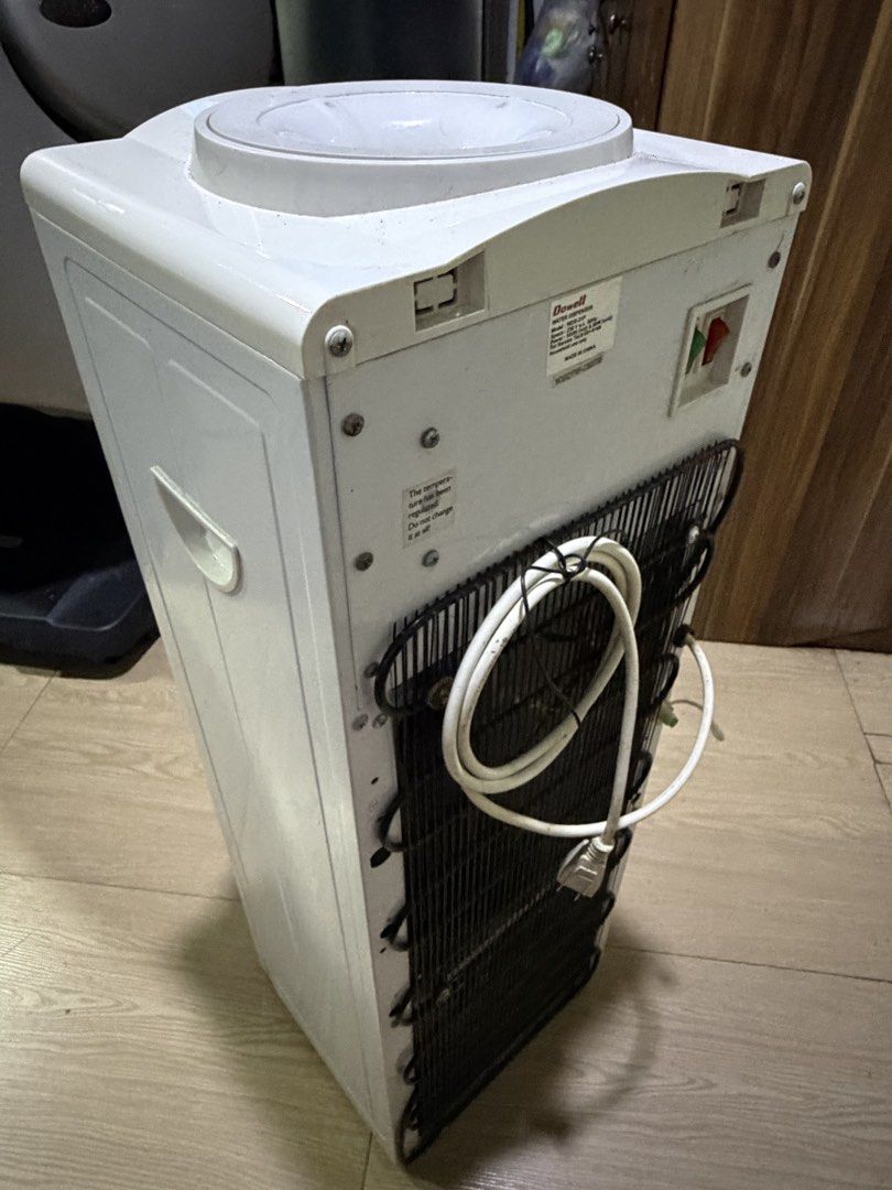 WATER DISPENSER (Category: Pitchers & Dispensers) located in Manila. Submitted by yellowstar08 (Listing ID 1460581456, Image 2). Description: -Top load water dispenser -Hot and cold water functions -2.5L cold water tank capacity -820ml hot tank capacity -5-gallon container compatible -Compressor type cooling -Stainless steel grade water tank -Plastic & metal body material LED display indicators for power. hot and cold, pushtaps -With drain access