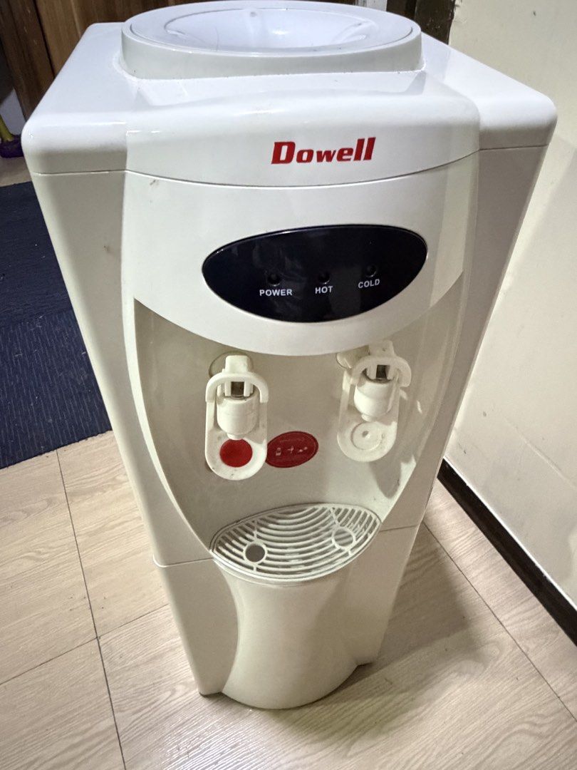 WATER DISPENSER (Category: Pitchers & Dispensers) located in Manila. Submitted by yellowstar08 (Listing ID 1460581456, Image 1). Description: -Top load water dispenser -Hot and cold water functions -2.5L cold water tank capacity -820ml hot tank capacity -5-gallon container compatible -Compressor type cooling -Stainless steel grade water tank -Plastic & metal body material LED display indicators for power. hot and cold, pushtaps -With drain access