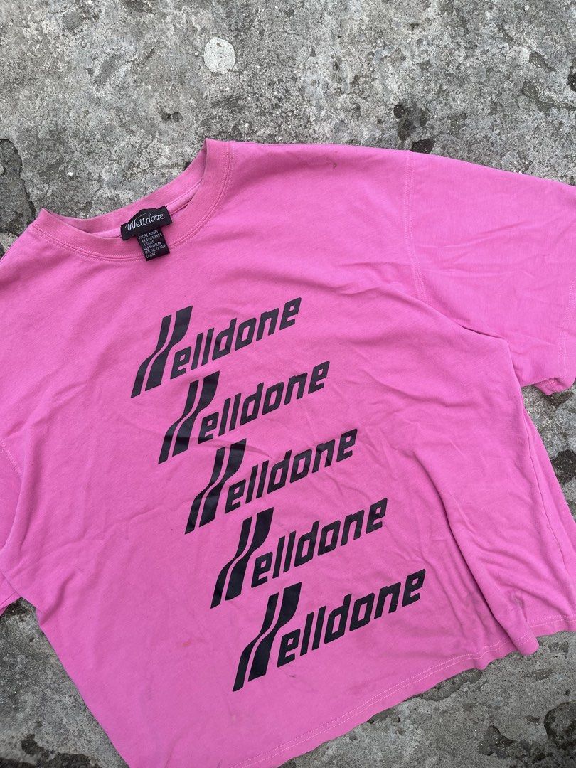Welldone Pink Graphic T-Shirt (Category: Tshirts & Polo Shirts ) located in Cavite. Submitted by vlblgrmnts_ (Listing ID 1460628172, Image 2). Description: - Pink t-shirt with multiple Welldone graphic prints - Short sleeves and crew neck design - Made from comfortable fabric for everyday wear - Versatile for casual styling with jeans or shorts - A unique statement piece to elevate your wardrobe Welldone Box Tee Good condi Size M on tag Dimes 24x