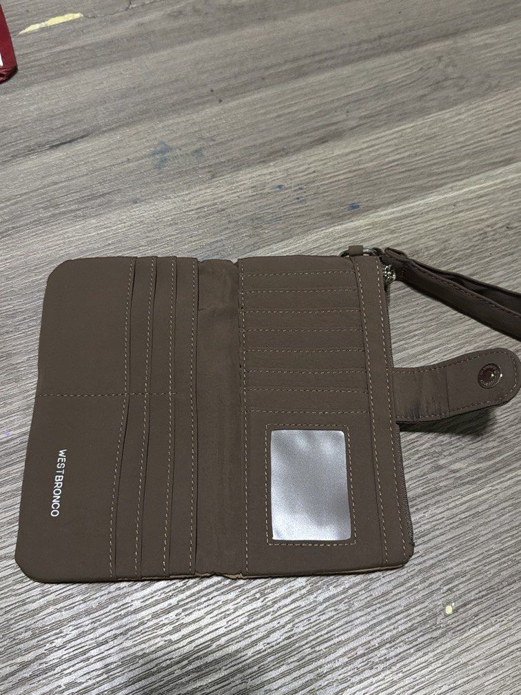 WESTBRONCO Puffer Wallet (Category: Wallets & Card holders) located in Quezon City. Submitted by littlegabu_treasures (Listing ID 1460520525, Image 3). Description: Used only as a spare wallet. In very good condition. Slight negotiable for sure buyers.☺️.