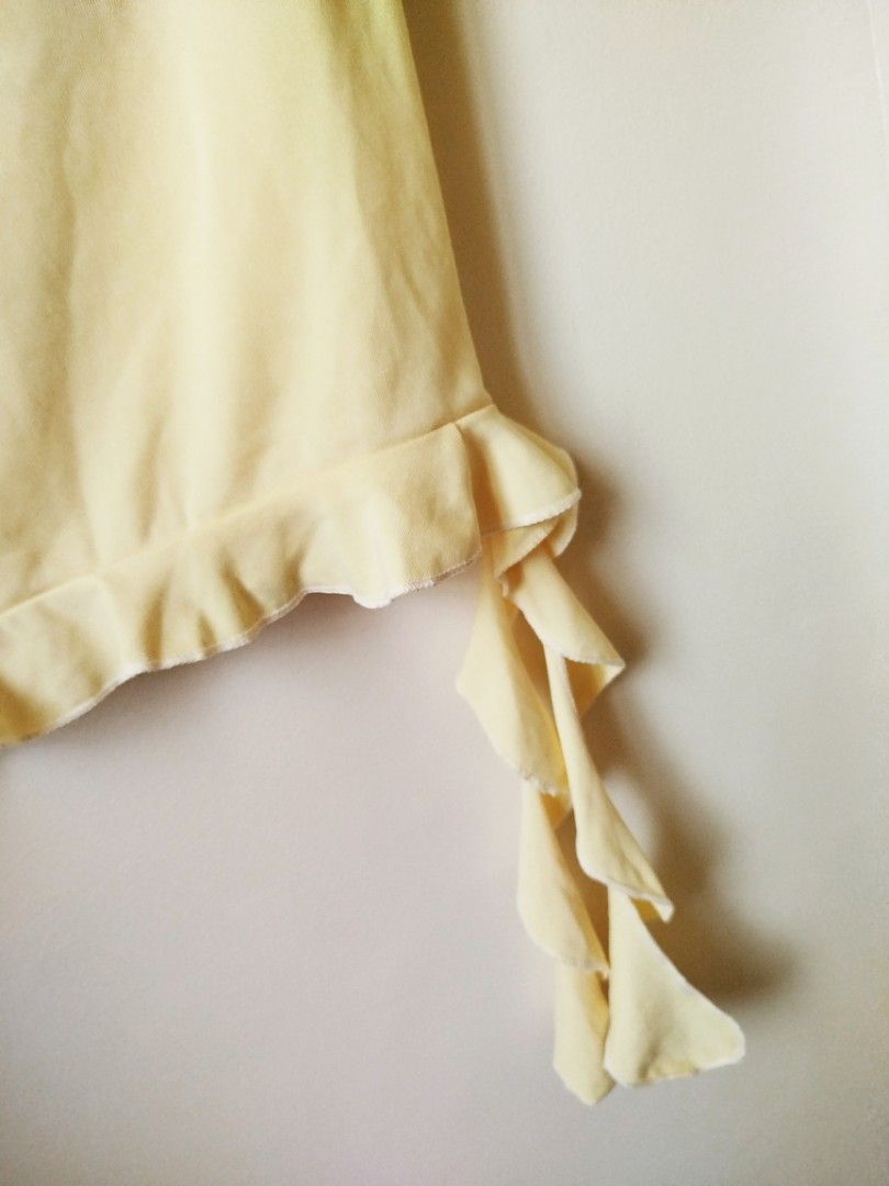 WHISICAL YELLOW BUTTERFLY TOP (Category: Blouses) located in Manila. Submitted by theveryday.apparel (Listing ID 1460666123, Image 2). Description: 🥨 100PHP (Korean Top - super pretty) Issue: has a small hole in front (see next slide) ۶ৎ medium - semi large size (worn once) ۶ৎ kindly send your order form before ordering..