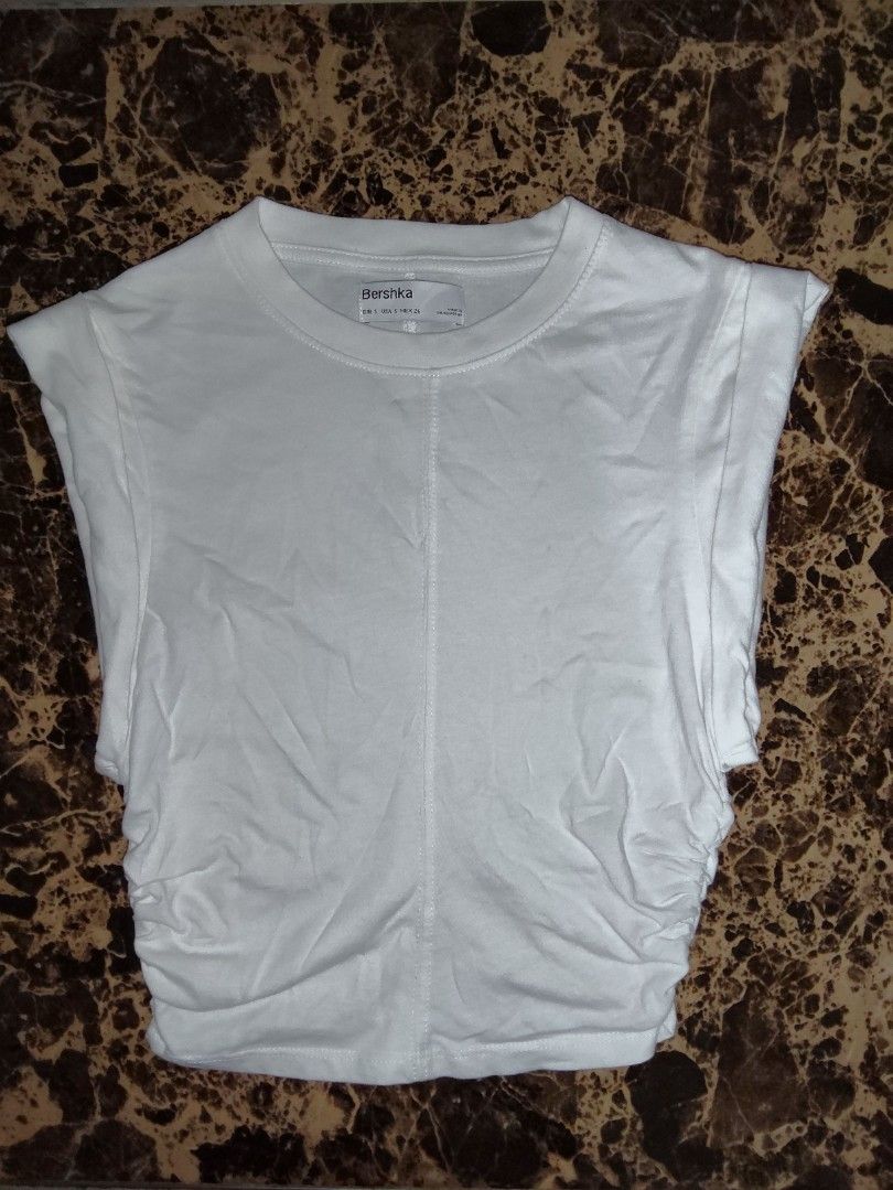 White Bershka Crew Neck Ruched Top (Category: Sleeveless) located in Manila. Submitted by chocobutternut_ (Listing ID 1460587460, Image 1). Description: .