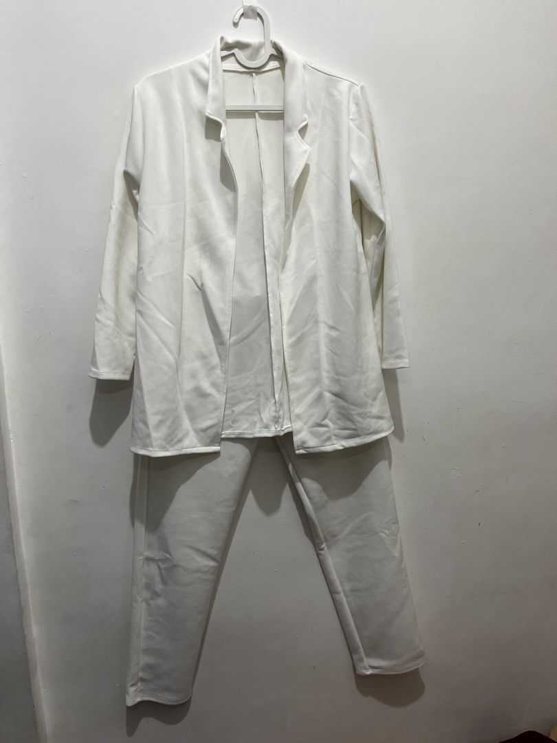 White Blazer and Pants Set (Category: Sets or Coordinates) located in Manila. Submitted by jonalainea95245 (Listing ID 1460708051, Image 1). Description: - White blazer and matching pants set - Blazer: Open front with lapels - Pants: Elastic waistband for comfort - Versatile: Great for professional or casual looks - Material: Comfortable fabric - Sold as a set Dimensions: (to follow) Location: Malabon RFS: decluttering.