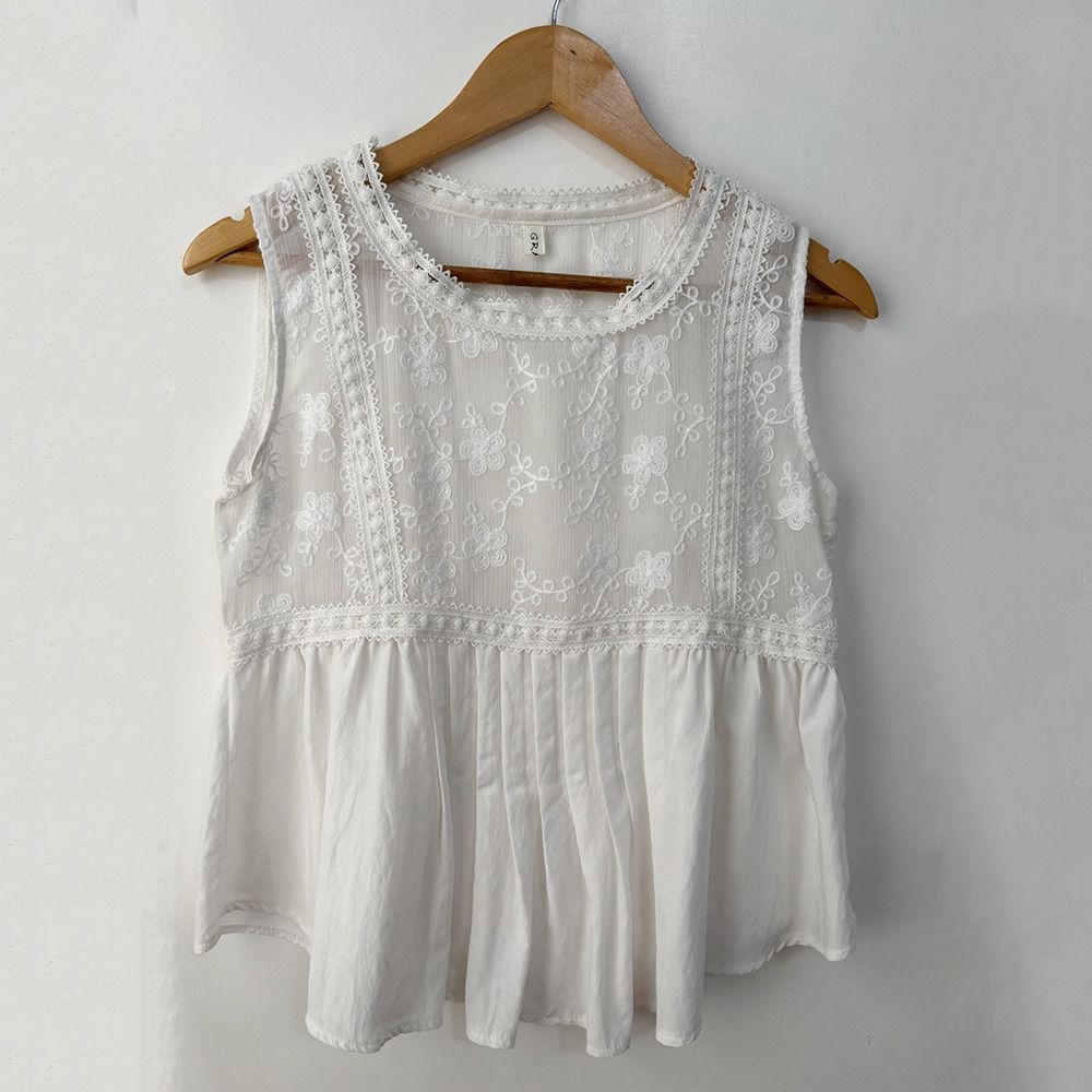 White Lace Semi-Cropped Sleeveless Top (Category: Sleeveless) located in San Fernando. Submitted by lilasboutique (Listing ID 1460583693, Image 1). Description: Size: SMALL (S) Chest: 34 in | Length: 21 in Fit: Regular Details: • PRELOVED. Good Condition • Brand: Grand • Color: White.