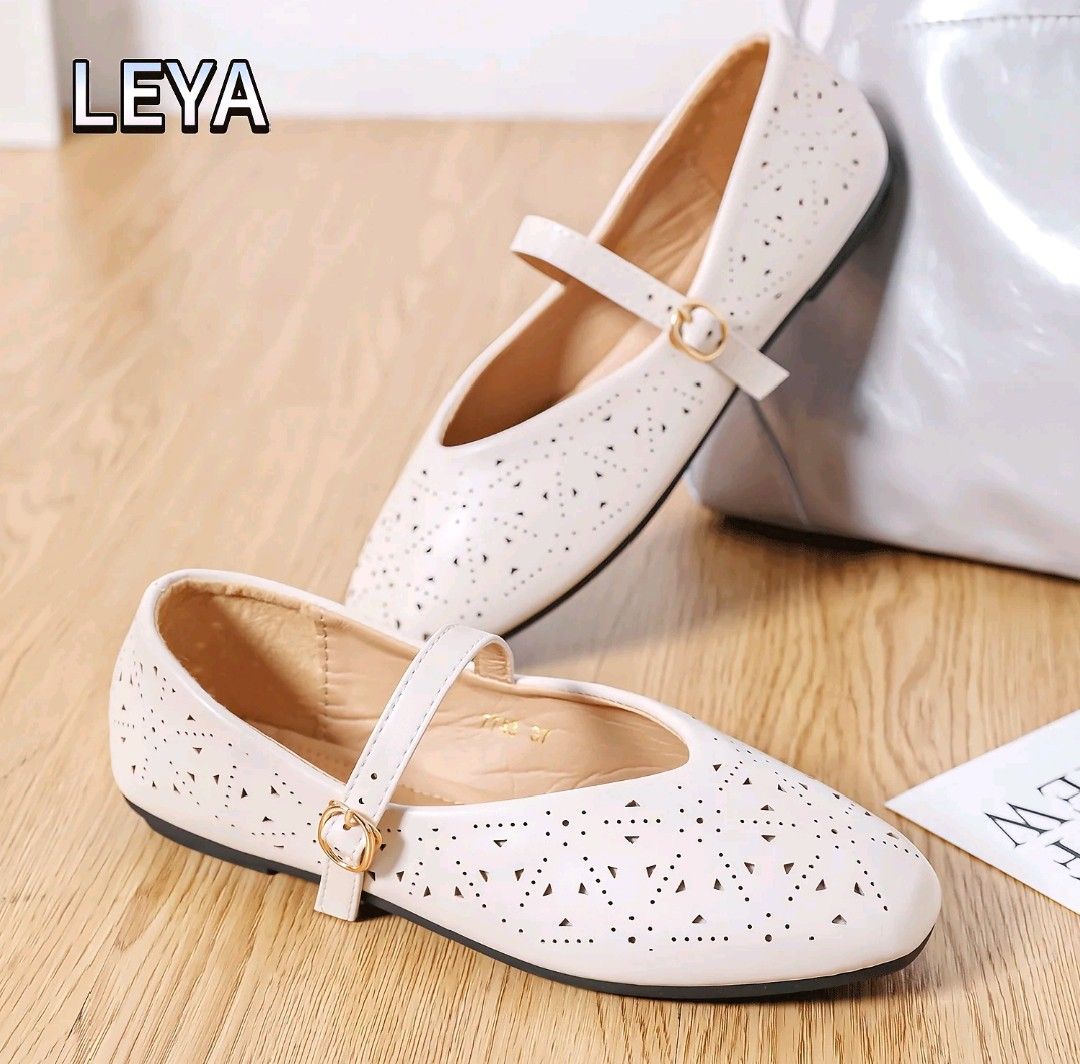 Beige Mary Jane Flats with Buckle Strap (Category: Flats & Sandals) located in Davao. Submitted by bybeverly (Listing ID 1460535831, Image 1). Description: -never been kay mali ang size, very nindot unta kaayo -mahal sa online around 200 plus -Cute white Mary Jane flats - Size 35 - Perforated design - Adjustable buckle strap - Textured grip sole - Comfortable padded insole - Perfect for casual or dressy occasions.