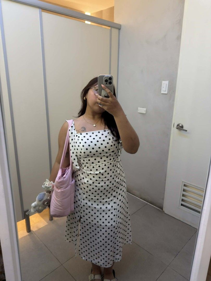 White Polka Dot Midi Dress with Slit (Category: Dresses) located in San Pedro. Submitted by ursamshine_ (Listing ID 1460682474, Image 1). Description: - Cute white midi dress with black polka dots - Flattering wrap style - Thigh-high slit for a stylish touch - Sleeveless with a chic square neckline - Versatile: great for casual outings or summer parties - Comfortable and easy to wear.