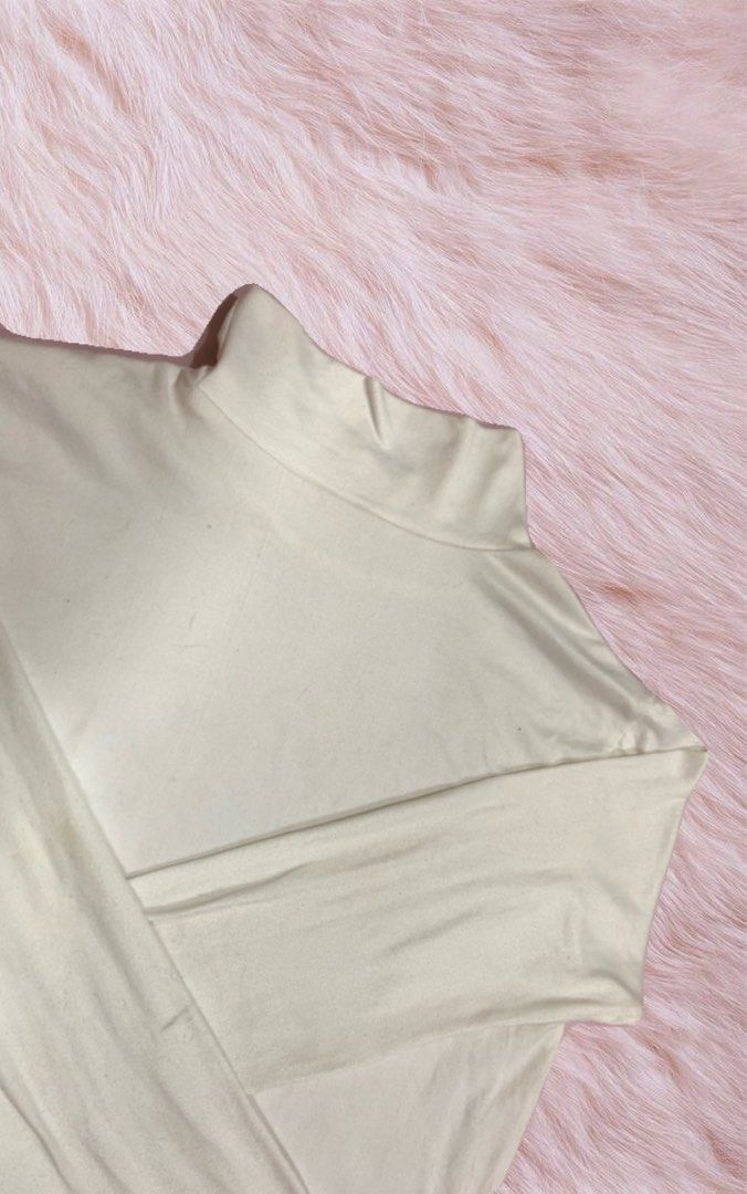 White Turtleneck Long Sleeve Shirt Double Lining (Category: Longsleeves) located in Caloocan City. Submitted by heaven.ly (Listing ID 1460561670, Image 2). Description: Brand: Bought on Black App (TT) Color: White (color may vary due to lighting) Size: S-M 🏷️ Price: 150 Good as new Nakatambak lang so need labhan bago gamitin<3.