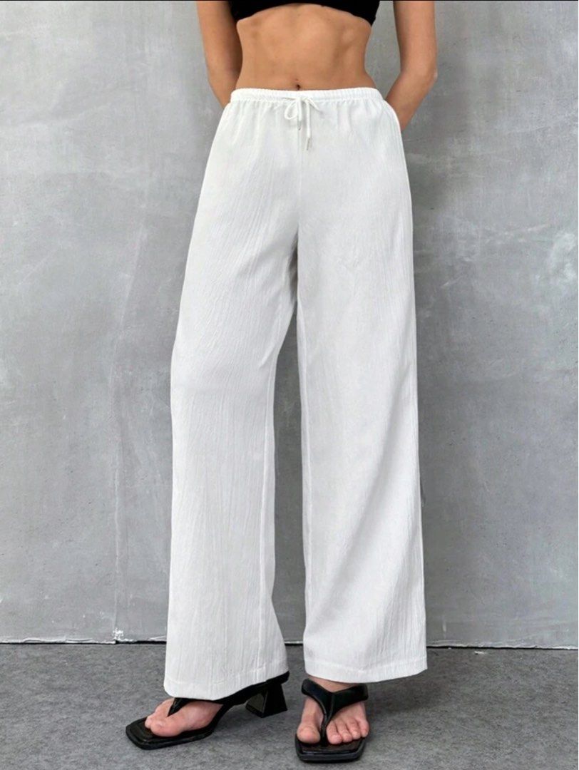 White Wide Leg Pants (Category: Other Bottoms) located in Manila. Submitted by zyyjcnt (Listing ID 1460526722, Image 1). Description: - Comfy white wide leg pants - Elastic waistband with adjustable drawstring - Versatile for lounging or casual outings - NEVER WORN - rfs: too long for me.