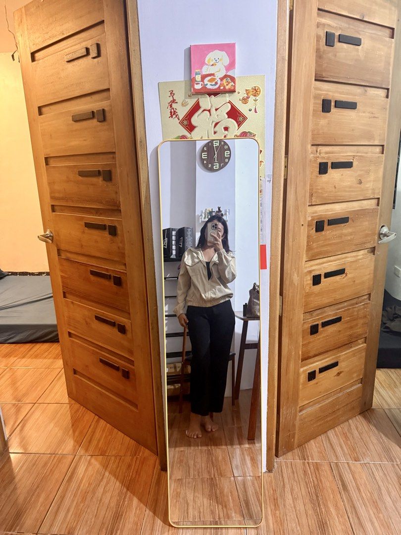 WHOLE BODY MIRROR (Category: Mirrors) located in Quezon City. Submitted by rqdt.quezoncity (Listing ID 1460689724, Image 1). Description: AESTHETIC WHOLE BODY MIRROR✨ ‼️DIRECT BODEGA💯 PERFECT FOR YOUR HOME, CONDO OR OUTFIT CHECK MIRROR ✅ PERFECT GIFT 🎁 • SIZE: 150*40cm • Easy to assemble • Space saver • Floor Standing • Swing Adjustment/Steady • Wall mounted * Leaning Available Colors: • Black 🖤 • Gold 💛 • White 🤍 📍DIRECT MESSAGE ME, THANK 