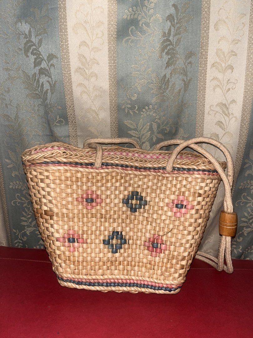 Woven fiber handbag (Category: Beach Bags) located in Davao. Submitted by janna_soleil (Listing ID 1460612638, Image 1). Description: charming woven natural fiber handbag featuring colorful pink and dark geometric flower motifs..