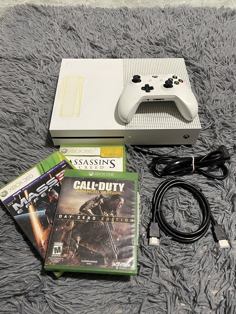 Xbox One S (Category: Others) located in Manila. Submitted by cid_barcelona1 (Listing ID 1460704259, Image 1). Description: - Xbox One S Console - 1 White Controller - Call of Duty: Advanced Warfare Day Zero Edition - Assassin's Creed - Mass Effect - All necessary cables included - Fresh unit guarantied sealed - light stain on case as seen on pic.