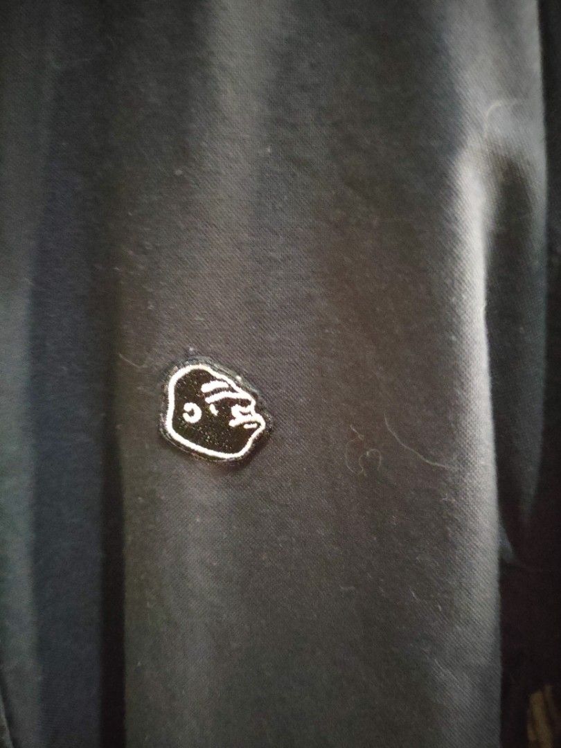 XLARGE Short Sleeve Button Up Shirt Camo Panel (Category: Tshirts & Polo Shirts ) located in Manila. Submitted by robertjust66965 (Listing ID 1460514959, Image 2). Description: - XLARGE short sleeve button-up shirt - Color: Black with camouflage side panels - Features iconic XLARGE gorilla logo on chest - Perfect for casual outfits.