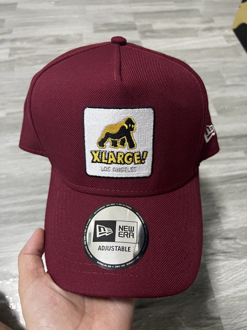 XLARGE x New Era Adjustable Cap Burgundy (Category: Caps & Hats) located in Cavite. Submitted by ziicollections (Listing ID 1460610052, Image 1). Description: - Brand: XLARGE x New Era - Color: Burgundy - Design: Classic XLARGE gorilla logo patch - Features: Adjustable New Era strap at the back - Style: Great for everyday wear - D-frame cap.