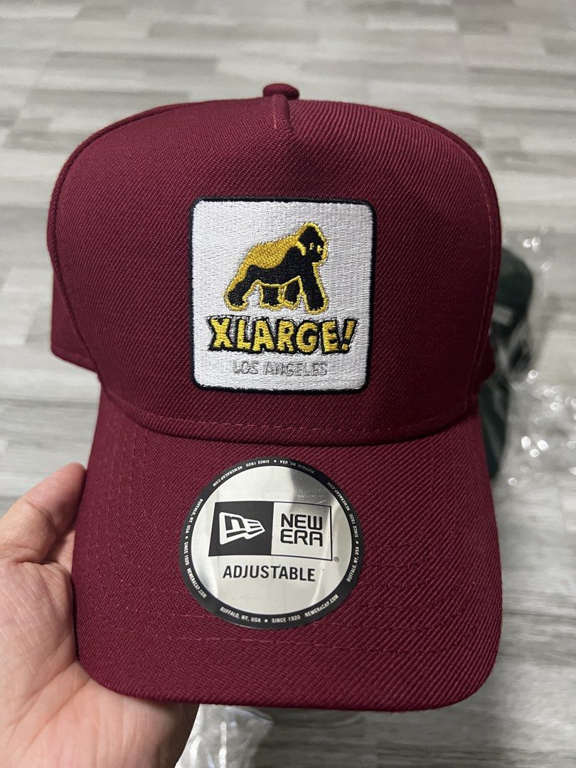 XLARGE x New Era Adjustable Cap Burgundy (Category: Caps & Hats) located in Cavite. Submitted by ziicollections (Listing ID 1460610052, Image 3). Description: - Brand: XLARGE x New Era - Color: Burgundy - Design: Classic XLARGE gorilla logo patch - Features: Adjustable New Era strap at the back - Style: Great for everyday wear - D-frame cap.