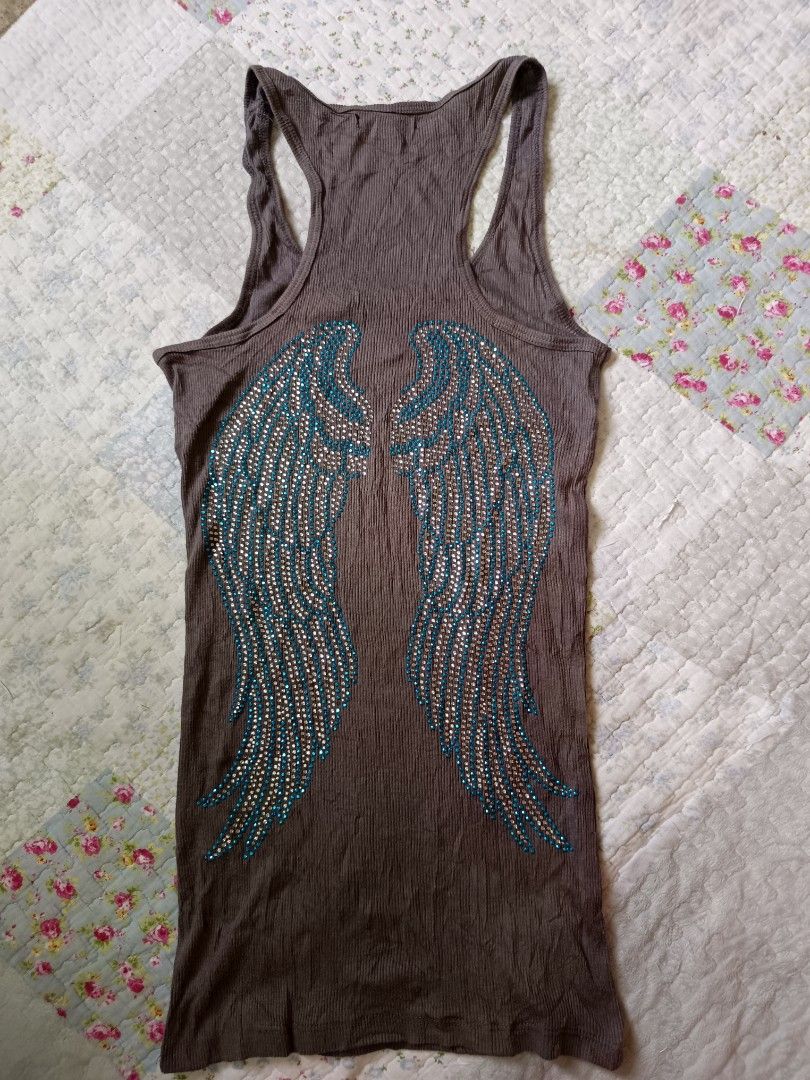 Y2k wings grunge style top (Category: Sleeveless) located in Davao. Submitted by mln-boutique (Listing ID 1460641031, Image 1). Description: Size - Small good condition brown colorway.