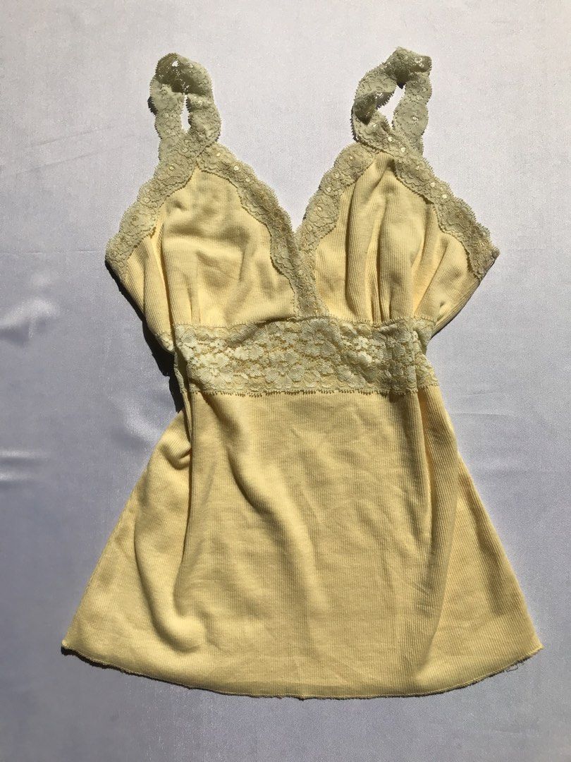 Yellow Lace Trim Sleeveless Top (Category: Sleeveless) located in Davao. Submitted by mira_e02 (Listing ID 1460639272, Image 1). Description: Can fit to S-M girlies . .