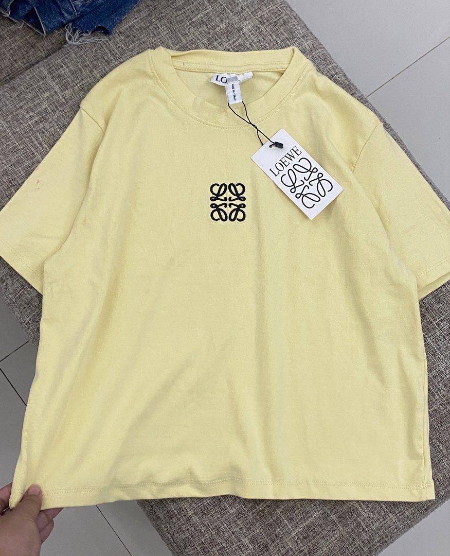 Yellow Loewe (Category: Blouses) located in Cabuyao City. Submitted by jennilyn_13 (Listing ID 1460648800, Image 2). Description: M-L.