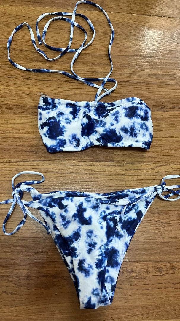Zaful Blue Tie-Dye Strapless Bikini (Category: Bikinis & Swimsuits) located in Taguig. Submitted by fayneayana (Listing ID 1460682185, Image 1). Description: - Adorable blue and white tie-dye bikini set - Strapless bandeau top with adjustable ties - Matching bottoms with adjustable side ties - Ideal for beach days and pool parties - Get ready for summer fun!.