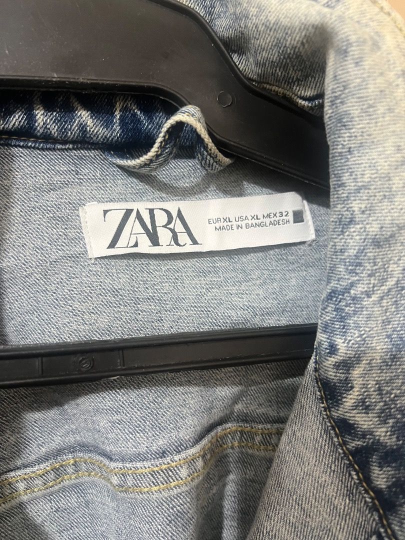 ZARA Acid Wash Denim Jacket (Category: Coats, Jackets and Outerwear) located in Pasay City. Submitted by sharshay317 (Listing ID 1460550210, Image 2). Description: Classic ZARA denim jacket. Acid wash finish for a retro vibe. Button-up front with two chest pockets. High collar detail. Made in Bangladesh. Great for layering..