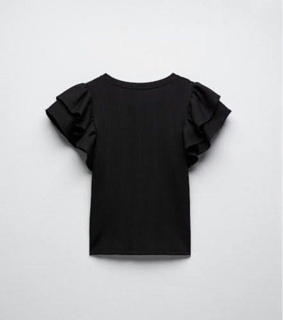 Zara Black Ribbed Flutter Sleeve Top (Category: Blouses) located in Manila. Submitted by eunicemarzan (Listing ID 1460646250, Image 2). Description: No tag Size: S on tag.