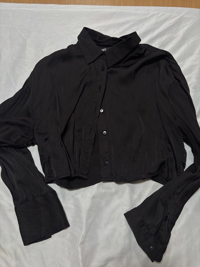 ZARA Black Silk Cropped Button-Up Shirt (Category: Shirts) located in Quezon City. Submitted by hscherryy (Listing ID 1460557120, Image 1). Description: with button details on the back.