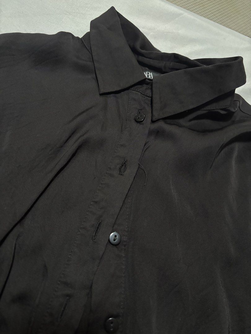 ZARA Black Silk Cropped Button-Up Shirt (Category: Shirts) located in Quezon City. Submitted by hscherryy (Listing ID 1460557120, Image 3). Description: with button details on the back.