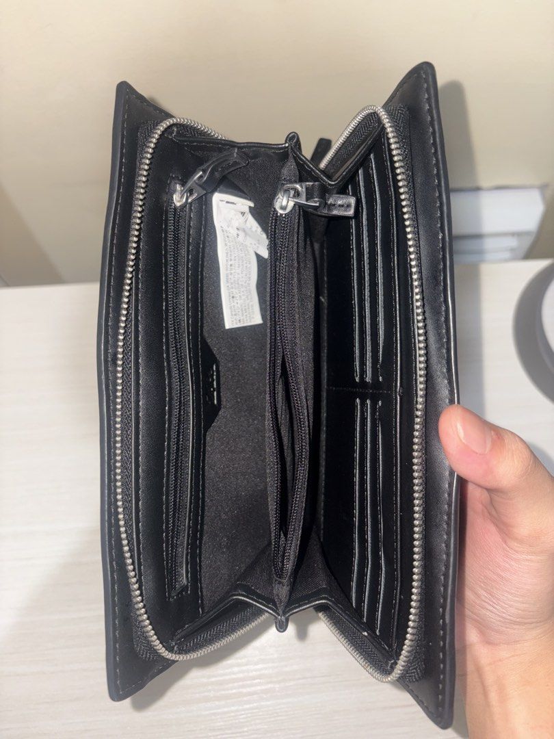 Zara Black Woven Zip Around Wallet (Category: Wallets & Card holders) located in Makati City. Submitted by martt_ (Listing ID 1460630075, Image 2). Description: FOR SALE!!! Zara Black Woven Zip Around Wallet 500 pesos only (Original price: 2,590) Pre-loved (good as new) MOP: gcash/bpi MOD: lalamove Loc: paranaque Rfs: need allowance for school.