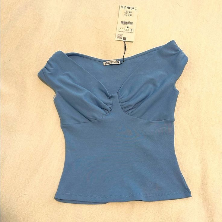 Zara Blue Off Shoulder Top (Category: Blouses) located in Quezon City. Submitted by tshsmnl (Listing ID 1460667006, Image 3). Description: Small on tag Smallest size (can fit xs-s) No flaws Used twice only Shipping via lalamove only.