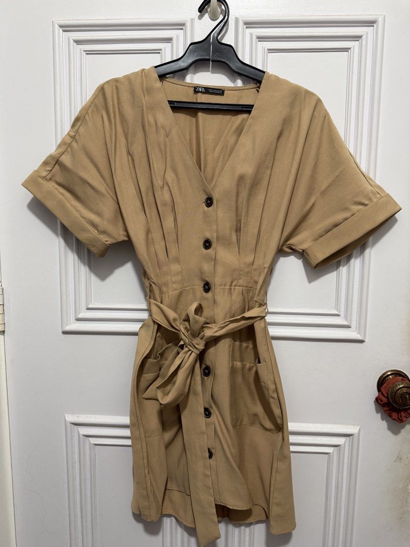 Zara Brown Dress (Category: Dresses) located in Quezon City. Submitted by ayybee_closet (Listing ID 1460672673, Image 1). Description: - Like new, no damages/stains/rips - Buttoned down with a belt .