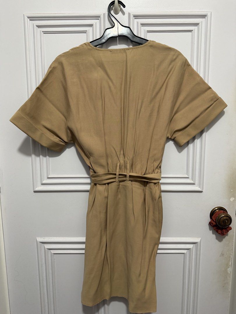 Zara Brown Dress (Category: Dresses) located in Quezon City. Submitted by ayybee_closet (Listing ID 1460672673, Image 2). Description: - Like new, no damages/stains/rips - Buttoned down with a belt .