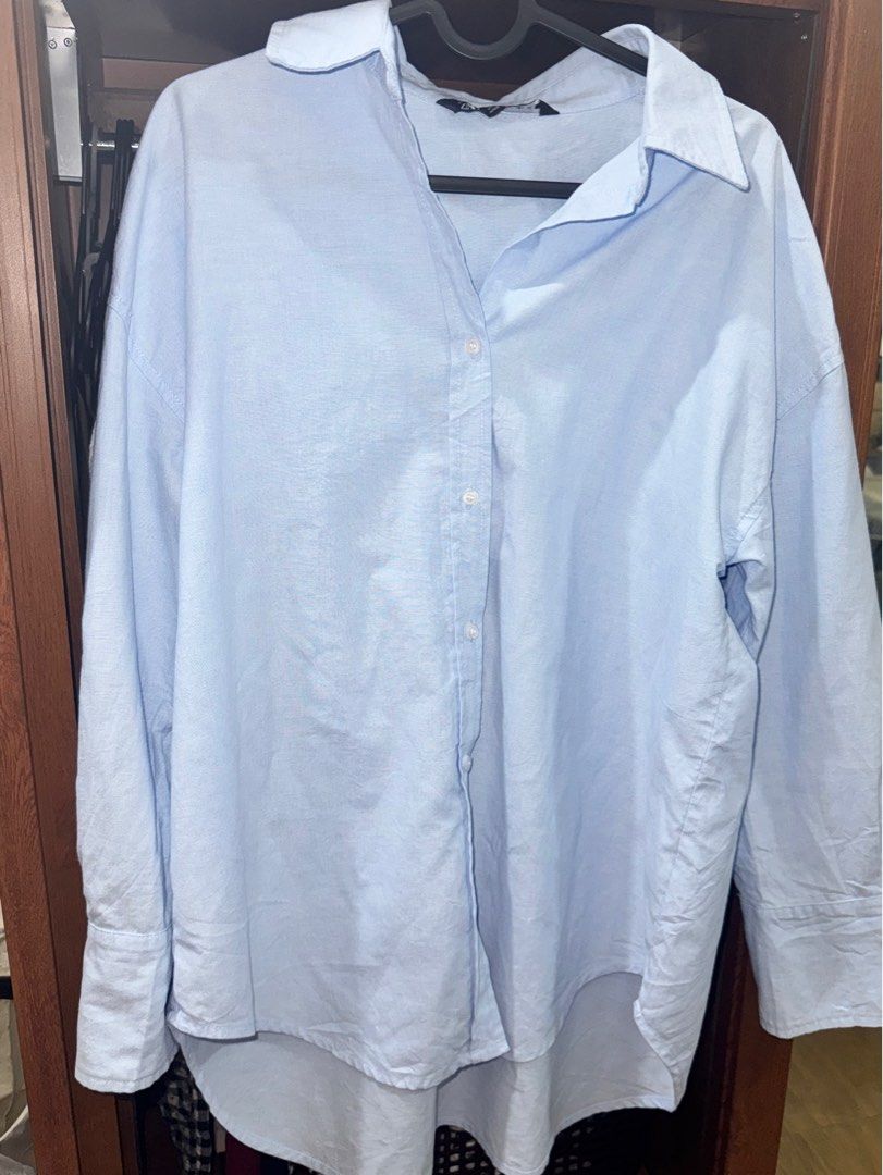 Zara Button Down Shirt (Powder Blue) (Category: Shirts) located in Los Banos. Submitted by myexcesstuff (Listing ID 1460664923, Image 1). Description: 🔆 my fave oversized shirt ! price is nego ₱₱₱ ✅ size (in tag S) but fits up to M ✅ flaws: stubborn yellow stains! not very noticeable naman, but pls see photos for ur reference ✅ rfs: not my style anymore ✅ preloved so please manage ur expectations ✅ actual color is reflected on the photos with fl