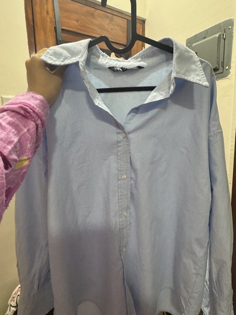 Zara Button Down Shirt (Powder Blue) (Category: Shirts) located in Los Banos. Submitted by myexcesstuff (Listing ID 1460664923, Image 3). Description: 🔆 my fave oversized shirt ! price is nego ₱₱₱ ✅ size (in tag S) but fits up to M ✅ flaws: stubborn yellow stains! not very noticeable naman, but pls see photos for ur reference ✅ rfs: not my style anymore ✅ preloved so please manage ur expectations ✅ actual color is reflected on the photos with fl