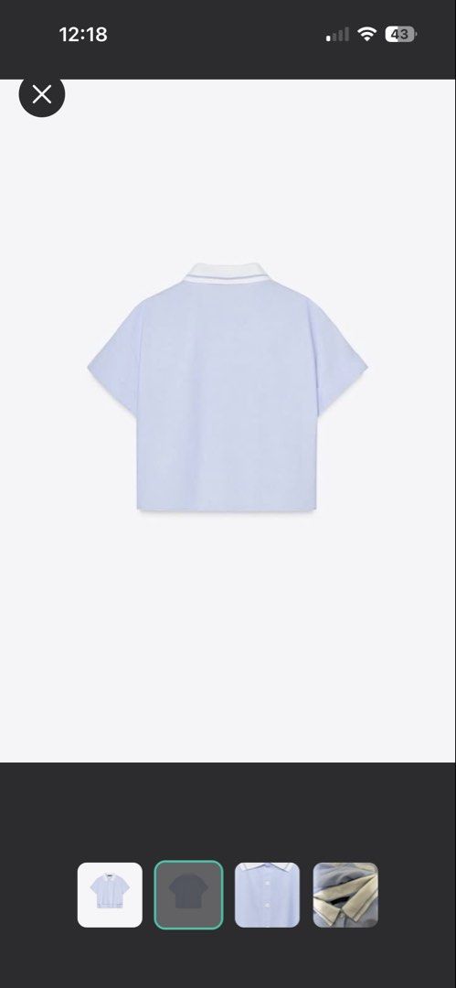 ZARA knitted polo collar (Category: Tshirts & Polo Shirts ) located in Quezon City. Submitted by lovedbymca (Listing ID 1460538849, Image 2). Description: - Light blue cropped polo shirt - White collar with blue stripes - Button-up front - Short sleeves - XS - Ideal for casual wear - Versatile and easy to style.