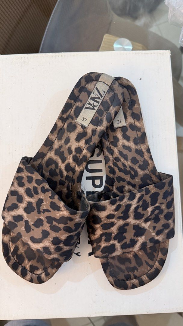 ZARA leopard flats (Category: Flats & Sandals) located in Quezon City. Submitted by bangtankthv (Listing ID 1460688629, Image 1). Description: Just need cleaning due to storage. No other flaws.