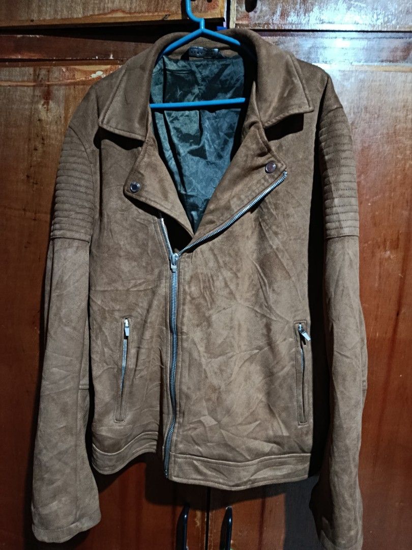 Zara Man Brown Suede Biker Jacket (Category: Coats, Jackets and Outerwear) located in Baguio. Submitted by dlv89288 (Listing ID 1460631146, Image 1). Description: - Zara Man Brown Suede Biker Jacket - Zip-up front with pockets - Ribbed detail on shoulders and sleeves - Lined interior - Size: 42 (EUR/UK/MEX) - missing part of the puller but still works nice - 22 x 26.