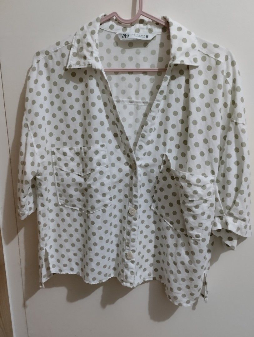 ZARA Polka Dot Button-Up Shirt (Category: Shirts) located in Mabalacat. Submitted by uniqlover (Listing ID 1460674184, Image 1). Description: - Button-up front - Two chest pockets - Short sleeves - Collar detail - Relaxed fit - Ideal for casual wear.