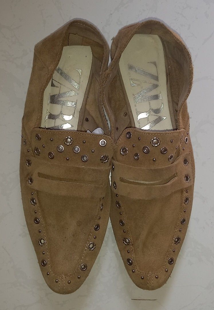 ZARA Tan Suede Studded Loafers (Category: Loafers) located in Cagayan de Oro. Submitted by edwardryan01984 (Listing ID 1460569875, Image 2). Description: - ZARA tan suede loafers - Features studded detail on edges and strap - Chic pointed toe design - Comfortable low heel - Perfect for dressing up or down - Please check photos for condition details.
