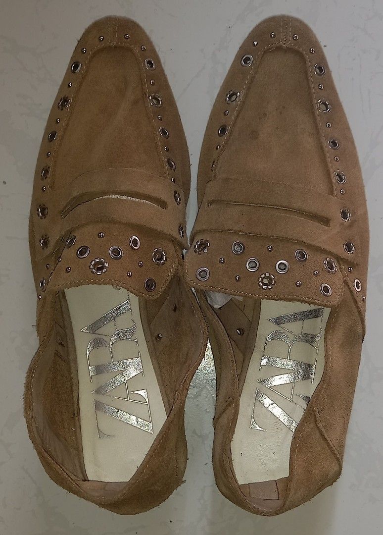 ZARA Tan Suede Studded Loafers (Category: Loafers) located in Cagayan de Oro. Submitted by edwardryan01984 (Listing ID 1460569875, Image 1). Description: - ZARA tan suede loafers - Features studded detail on edges and strap - Chic pointed toe design - Comfortable low heel - Perfect for dressing up or down - Please check photos for condition details.