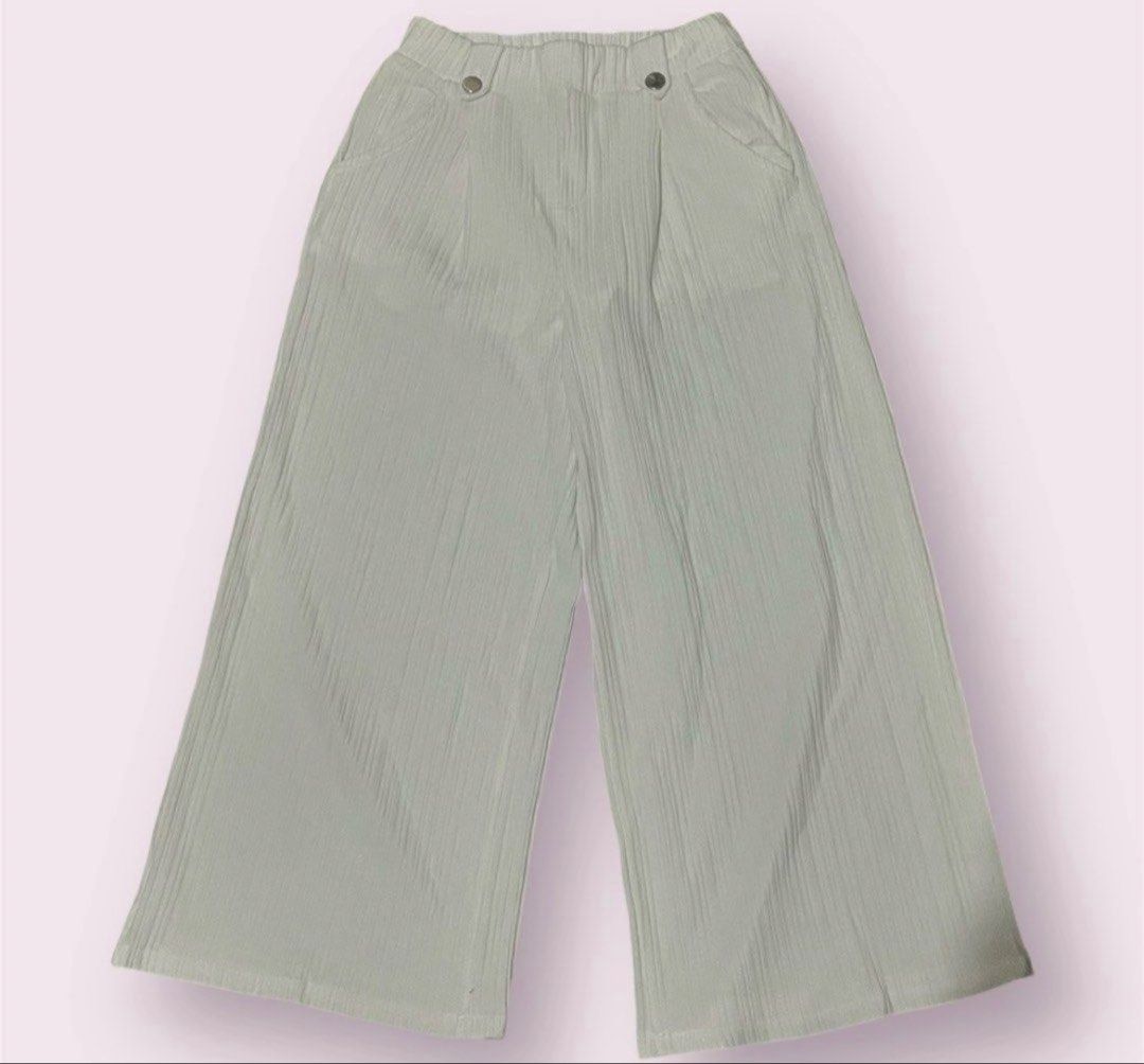 Zara White Cullottes Pants 9-10yo (Category: Babies & Kids Fashion) located in Rizal. Submitted by cassappl (Listing ID 1460708642, Image 1). Description: - Light green wide leg pants - Textured fabric for a unique look - Comfortable elastic waistband with decorative front buttons - Functional side pockets - Flattering wide leg silhouette - Ideal for casual everyday wear.
