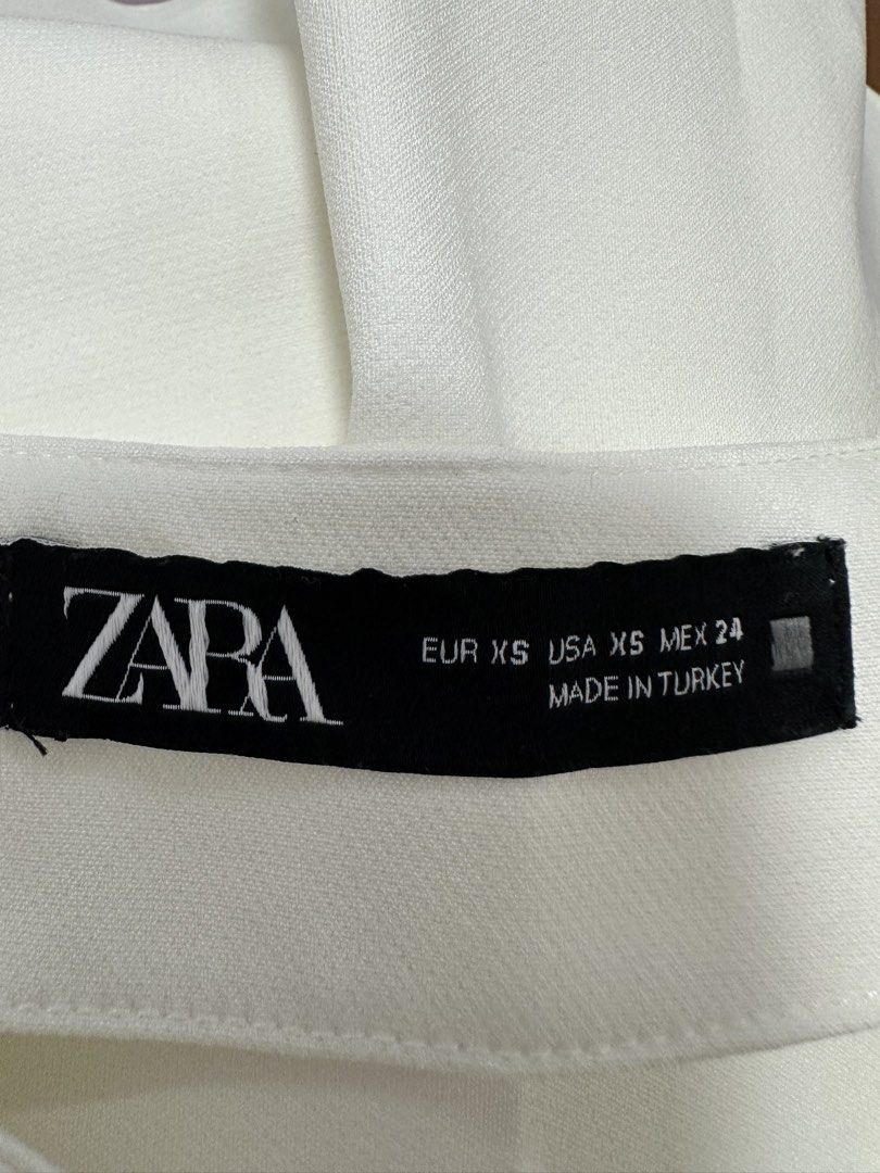 Zara White Flare Bow Skirt (Category: Skirts) located in Paranaque City. Submitted by kokoclosets (Listing ID 1460688703, Image 3). Description: Never used!.