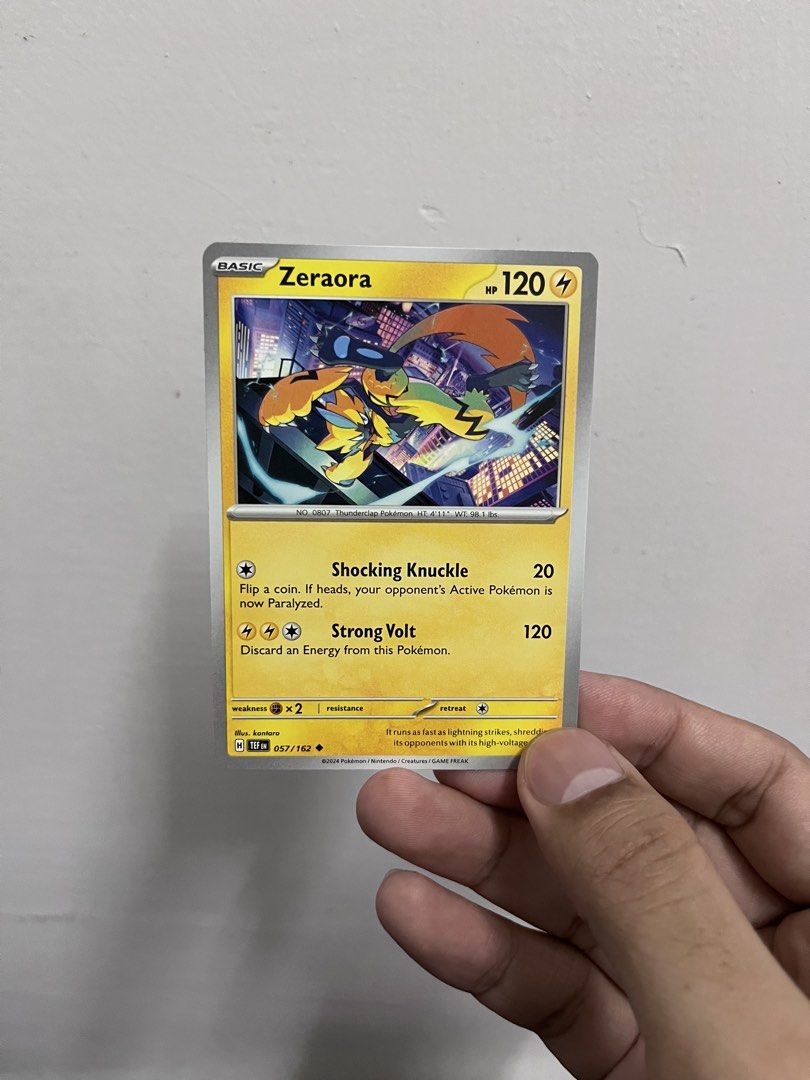 Zeraora Pokemon Card 057/162 (Category: Raw Singles) located in Pasay City. Submitted by paullimerized (Listing ID 1460613414, Image 1). Description: - Zeraora Pokemon Card - Set: 2024 - Card Number: 057/162 - HP: 120 - Attacks: Shocking Knuckle, Strong Volt - Ideal for collectors!.