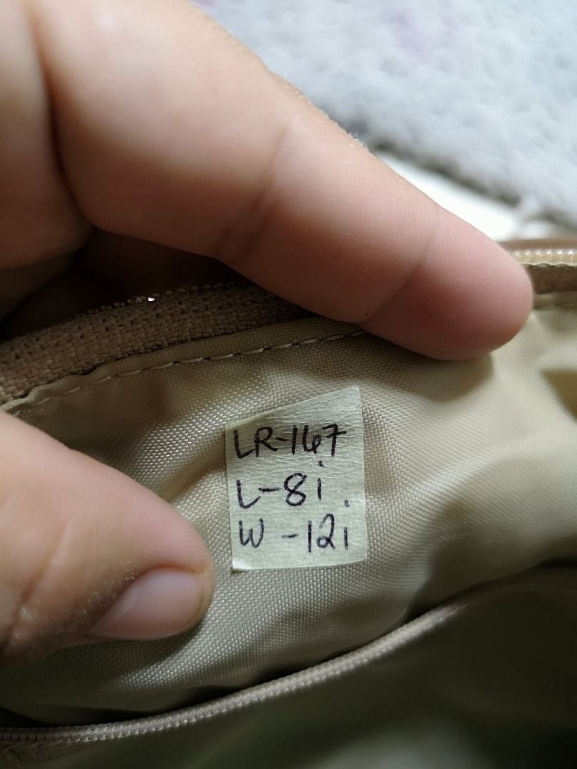 Zipper Closure Silver Tone Buckle Accent Shoulder Bag (Category: Shoulder Bags) located in Santa Cruz. Submitted by jmy_surplus.2 (Listing ID 1460590544, Image 3). Description: Size ; L - 8 W - 12 Color ; Beige Type ; Shoulder Bag Brand ; No brand Material ; Nylon Style ; Beige Zipper Closure Shoulder Bag LR 167 JMY 1 Batch #219.